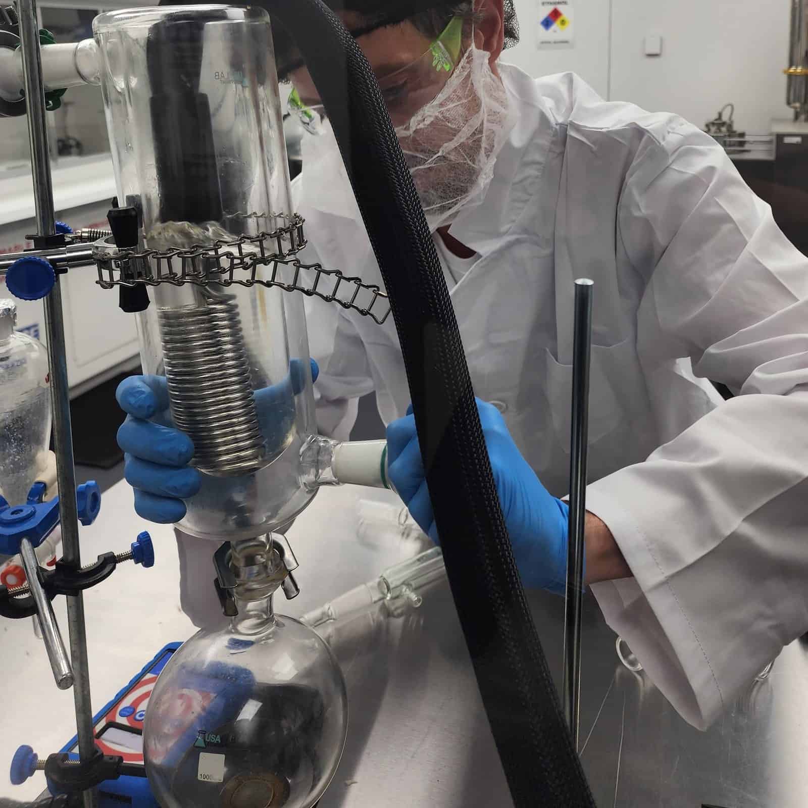 Seven-10 technician at a laboratory bench in Montego Bay